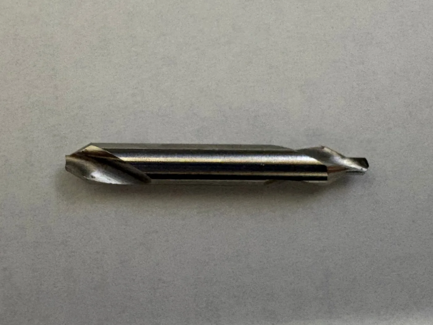 The broken center drill.